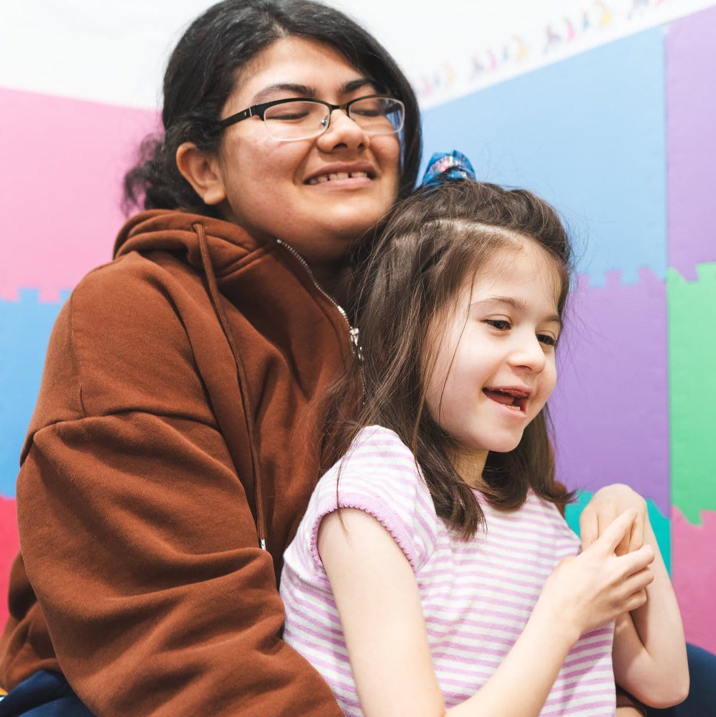 Children interacting during therapy session